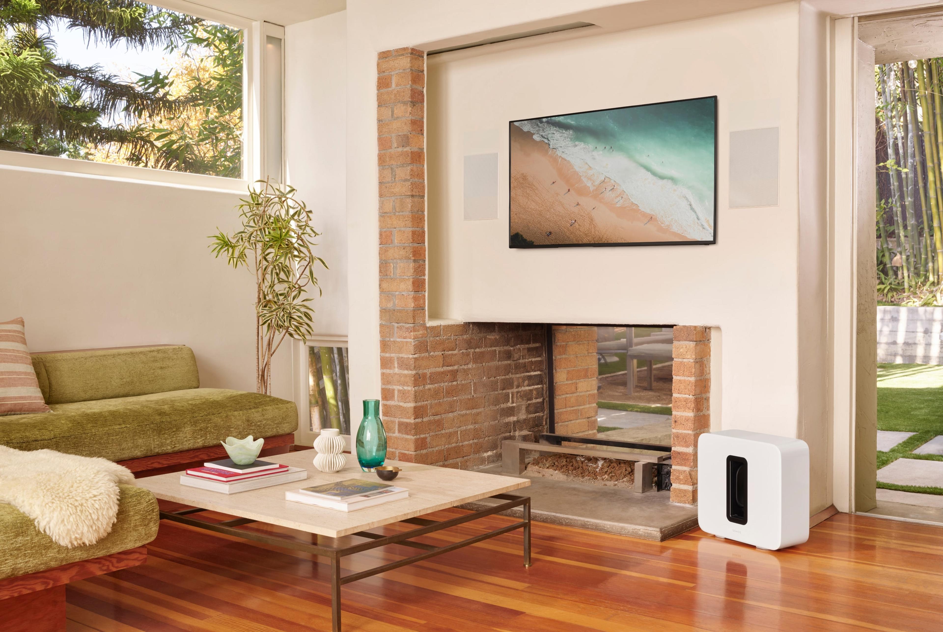 Home theater system with Sonance In-Wall speakers and white Sonos Sub