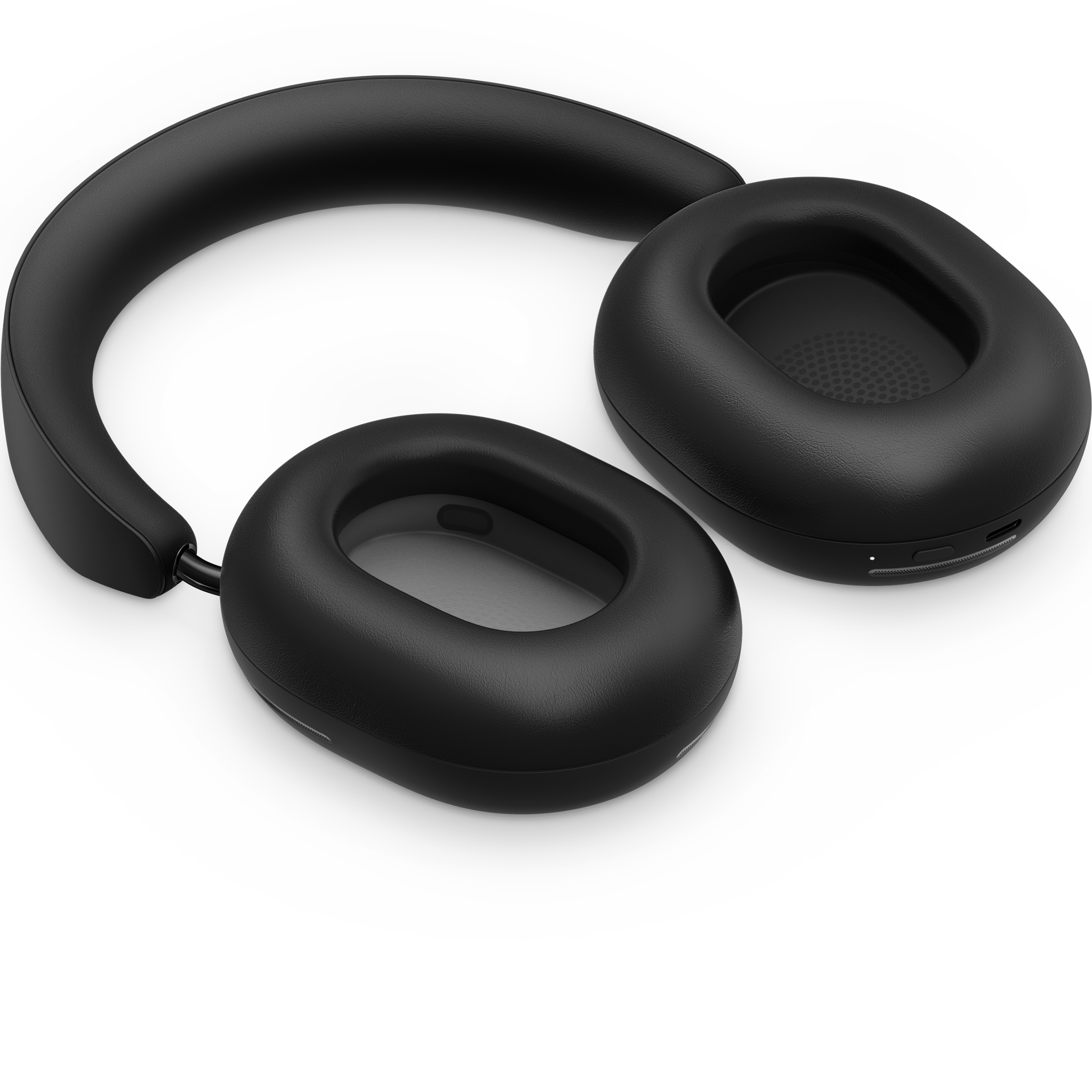 Sonos Ace headphones in black, laying flat with the ear cups turned up