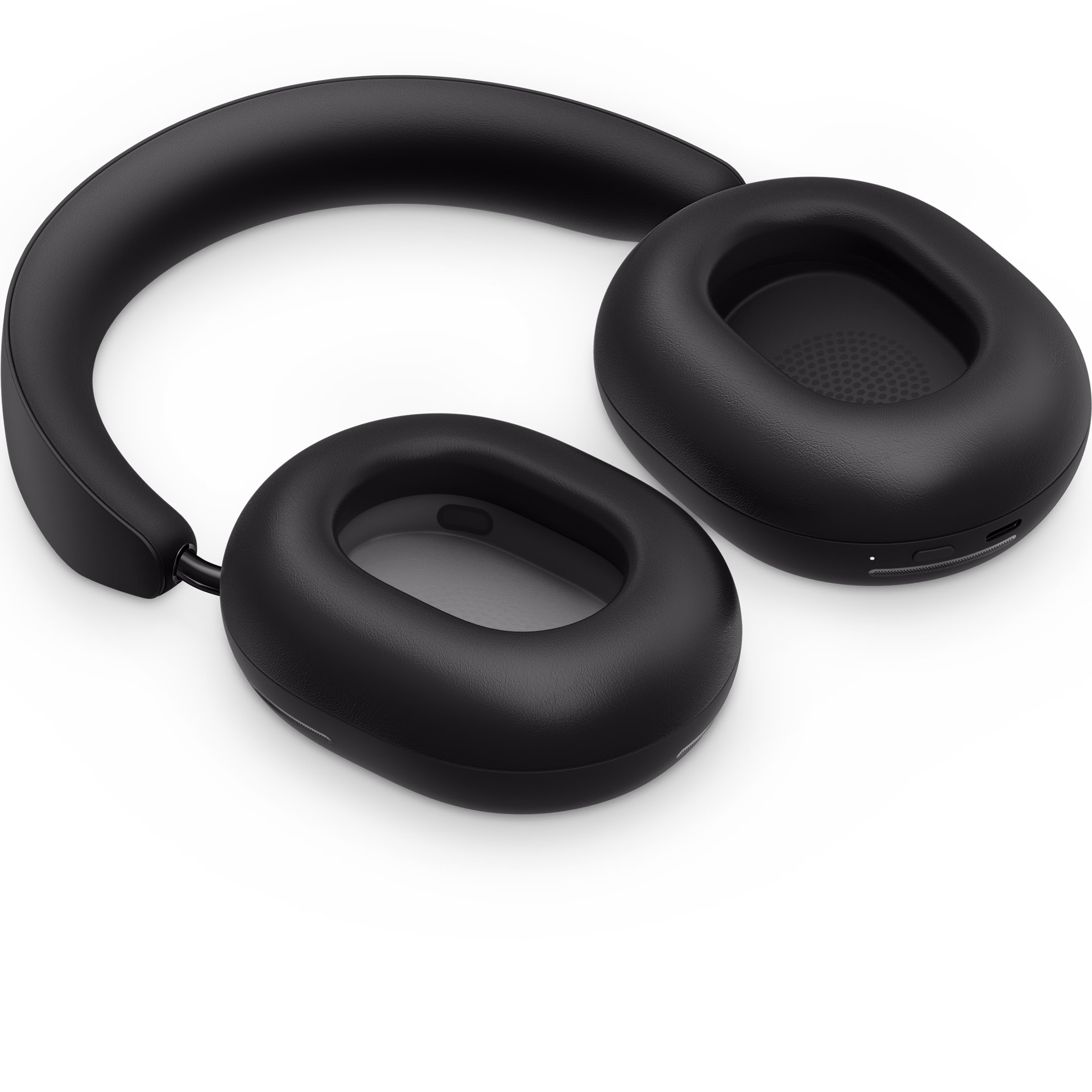 Sonos Ace headphones in black, laying flat with the ear cups turned up