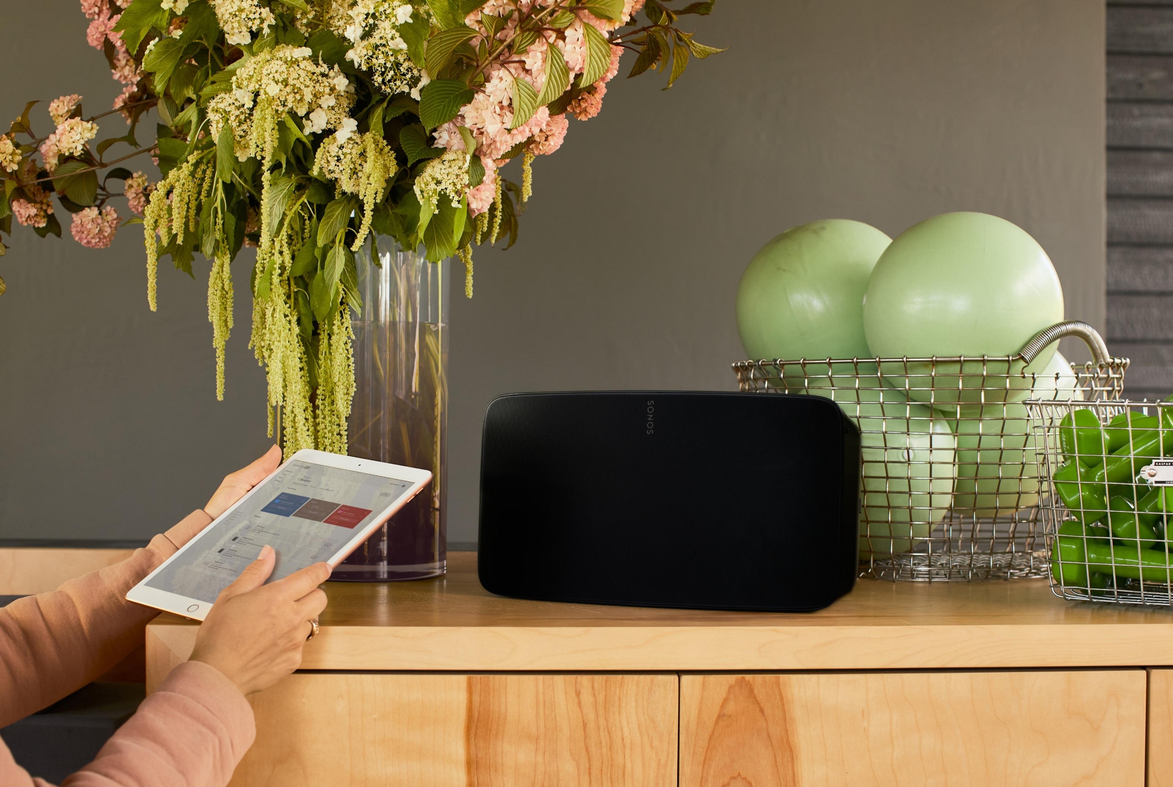 Sonos Five black and tablet with Sonos Pro dashboard
