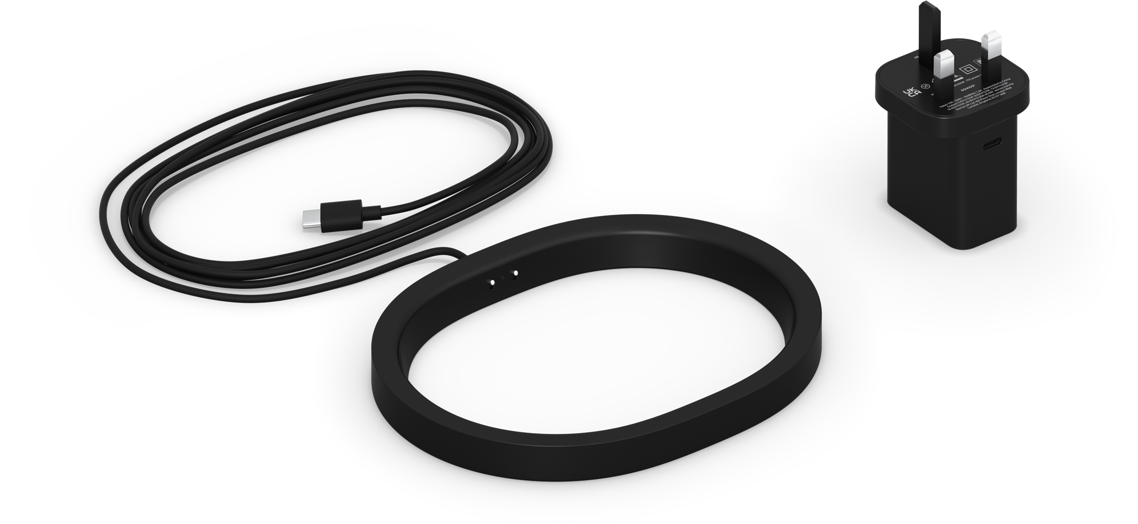 Image of the Move 2 Wireless Charging Base in black, with corresponding regional power plug