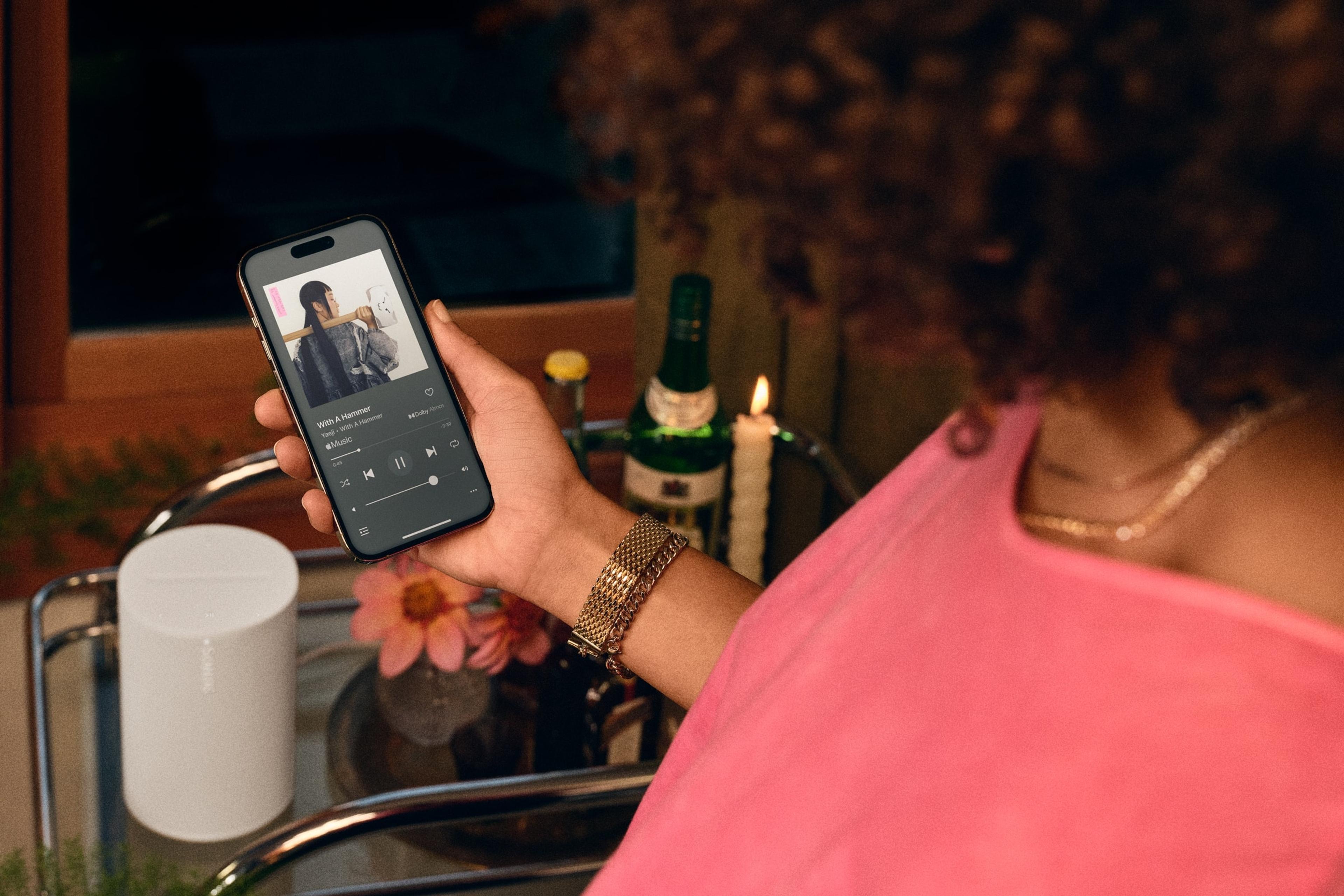 A user looking at the Now Playing screen of their Sonos app