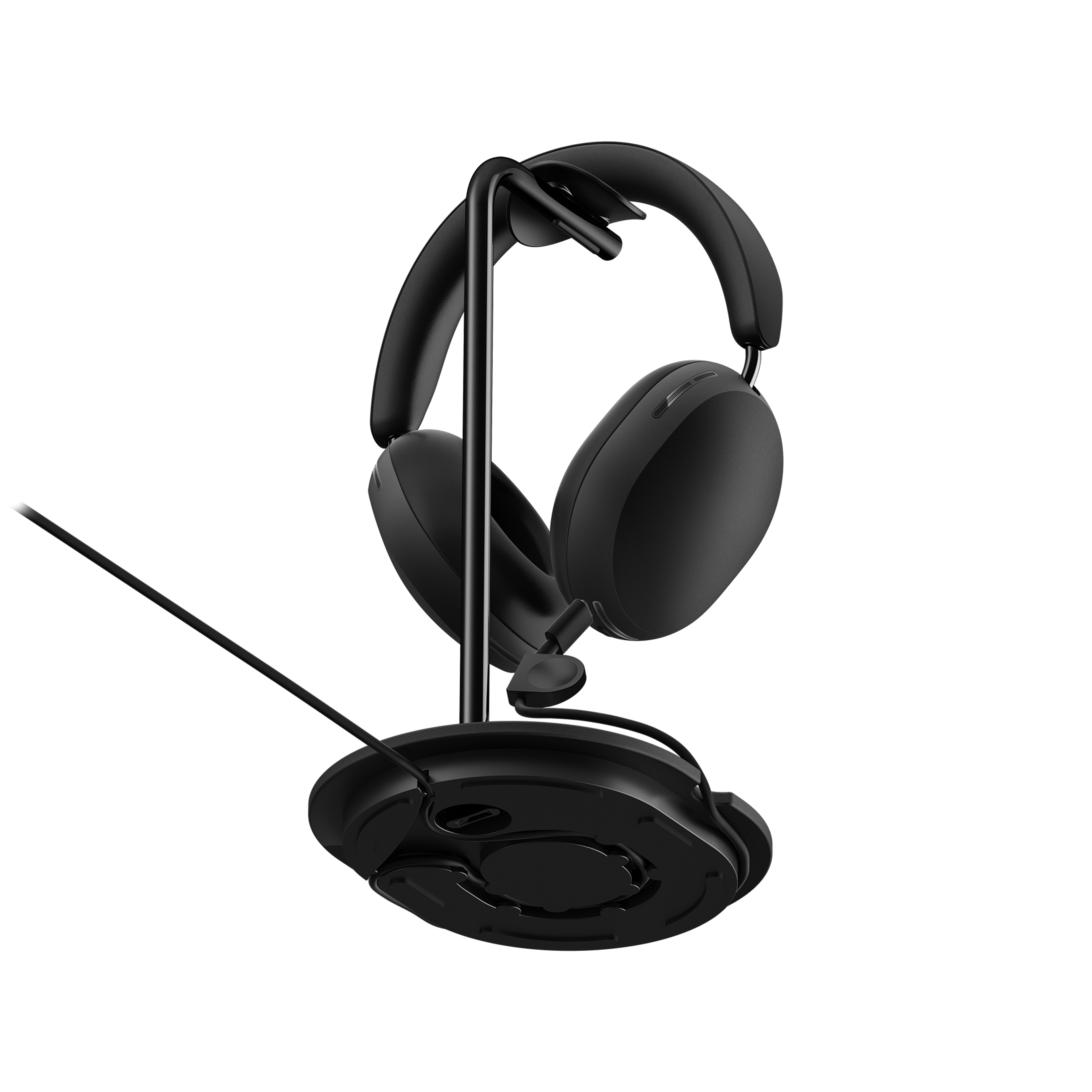 bottom view of black Sonos Ace headphones on Sanus Stand for Sonos Ace with cord showing
