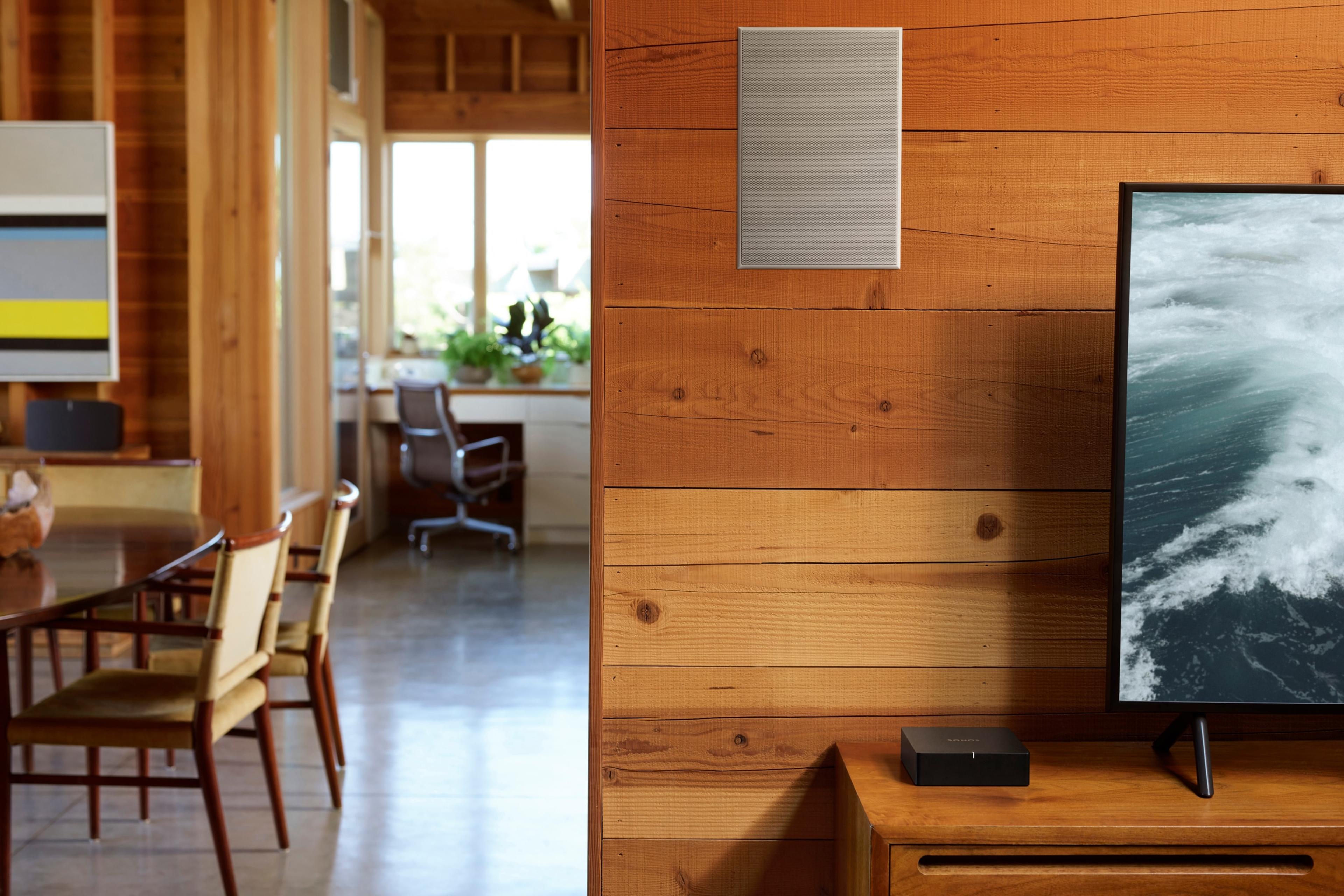Sonos Port shown with TV and installed in-wall speakers